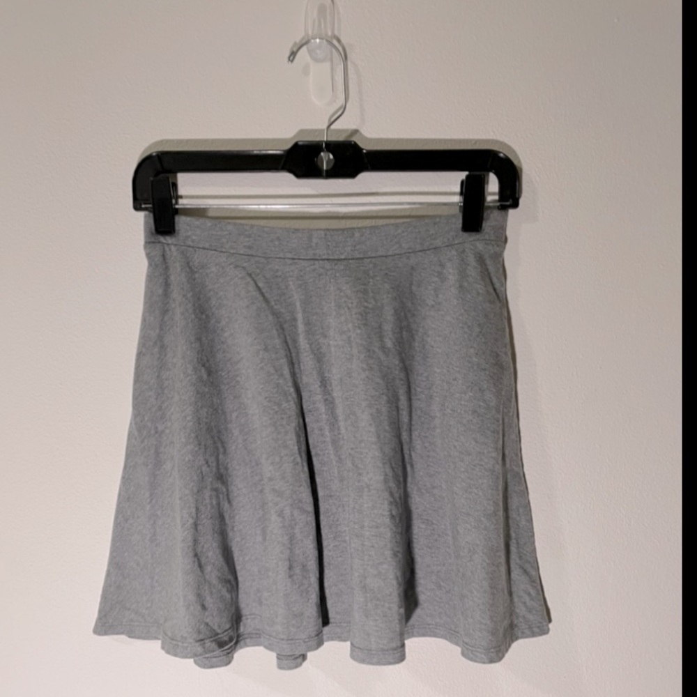 Light gray skater style shirt, Size US M. Forever 21